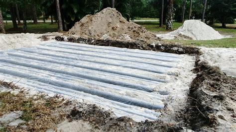 leech field working but wet above distribution boxes|leach field problems.